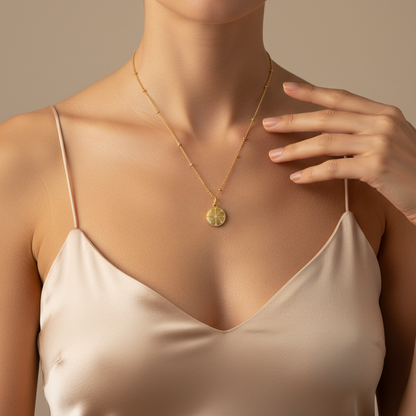 Champagne silk camisole with hand gesture