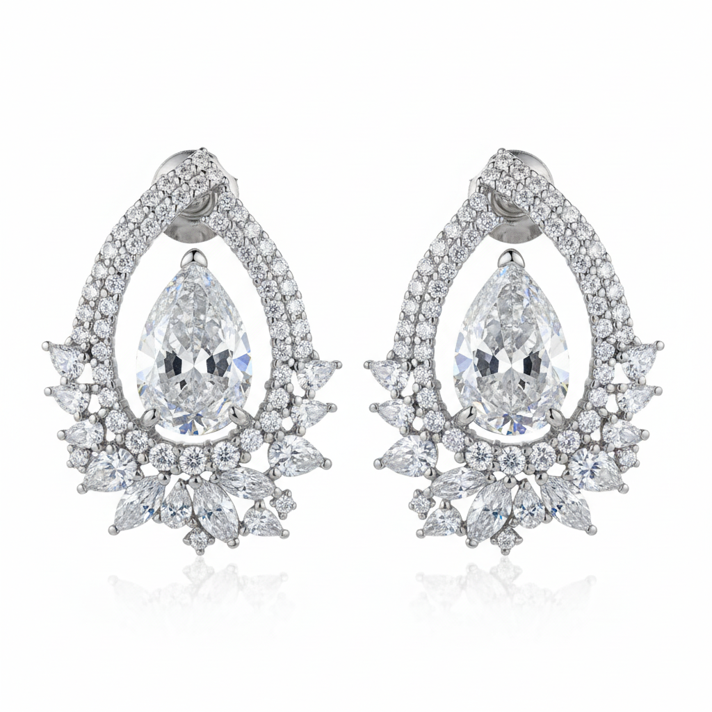 Elaborate diamond chandelier earrings on white background