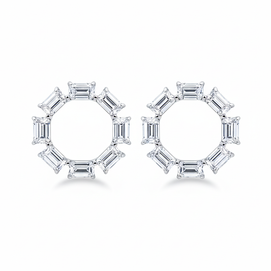 Geometric emerald-cut diamond hoop earrings on white background