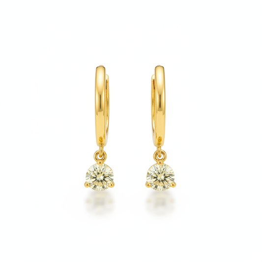 Gold hoop earrings with yellow diamond drop pendants on white background