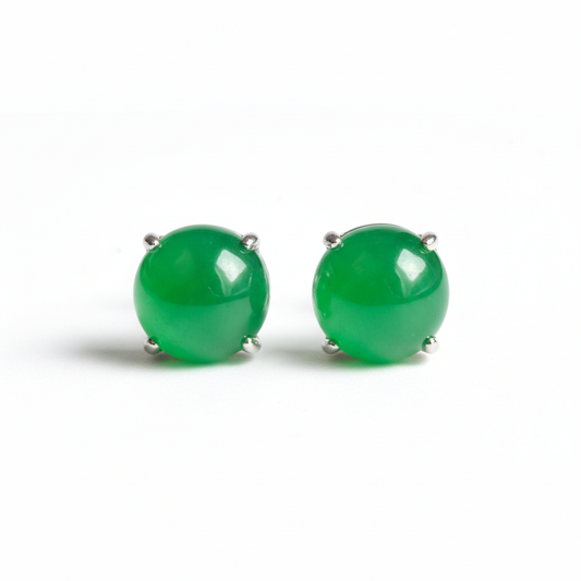 Green jade stud earrings on white background