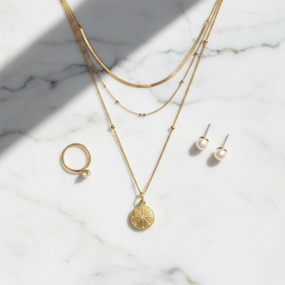Layered necklaces on marble