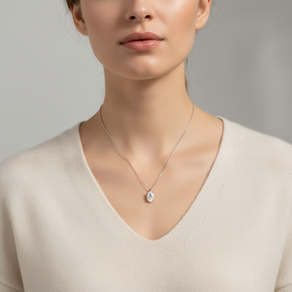 Lifestyle focusing on necklace - Caucasian model