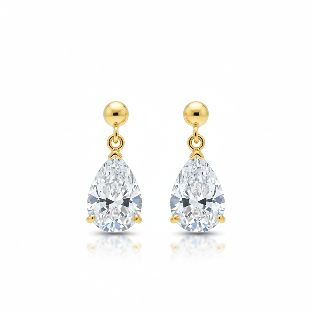 Pear-shaped diamond drop earrings on white background