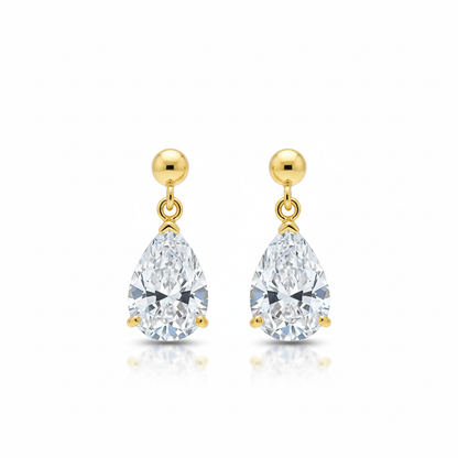 Pear-shaped diamond drop earrings on white background