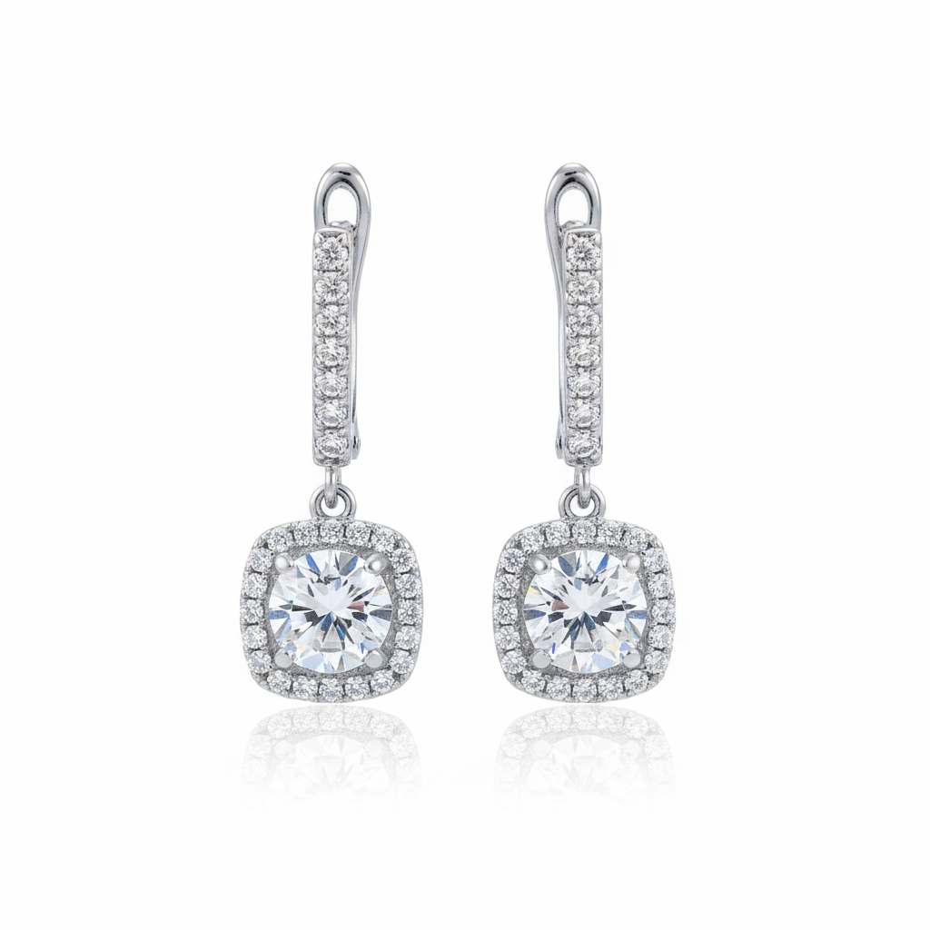 Silver cushion-cut halo drop earrings on white background